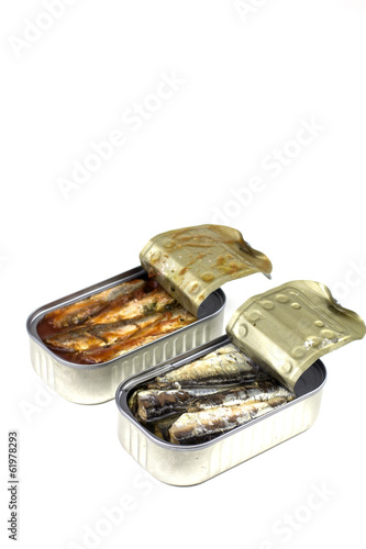 Two opened sardines cans