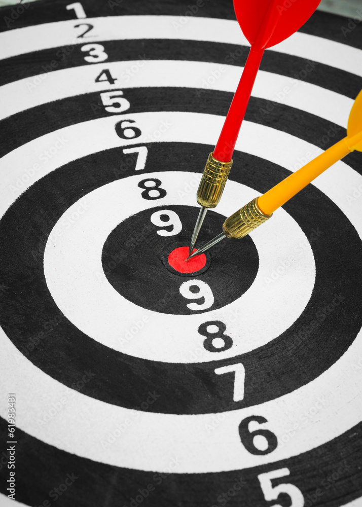 Business competition target concept and darts board Business competition target concept and darts board