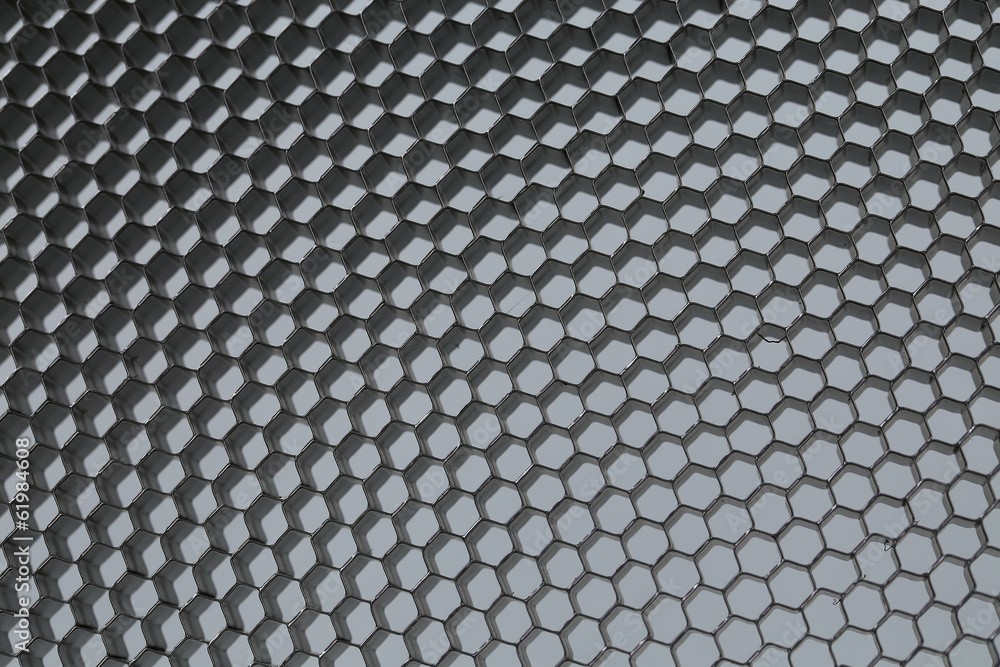 Close up of black net. Gray light. Close up of black net. Gray light.