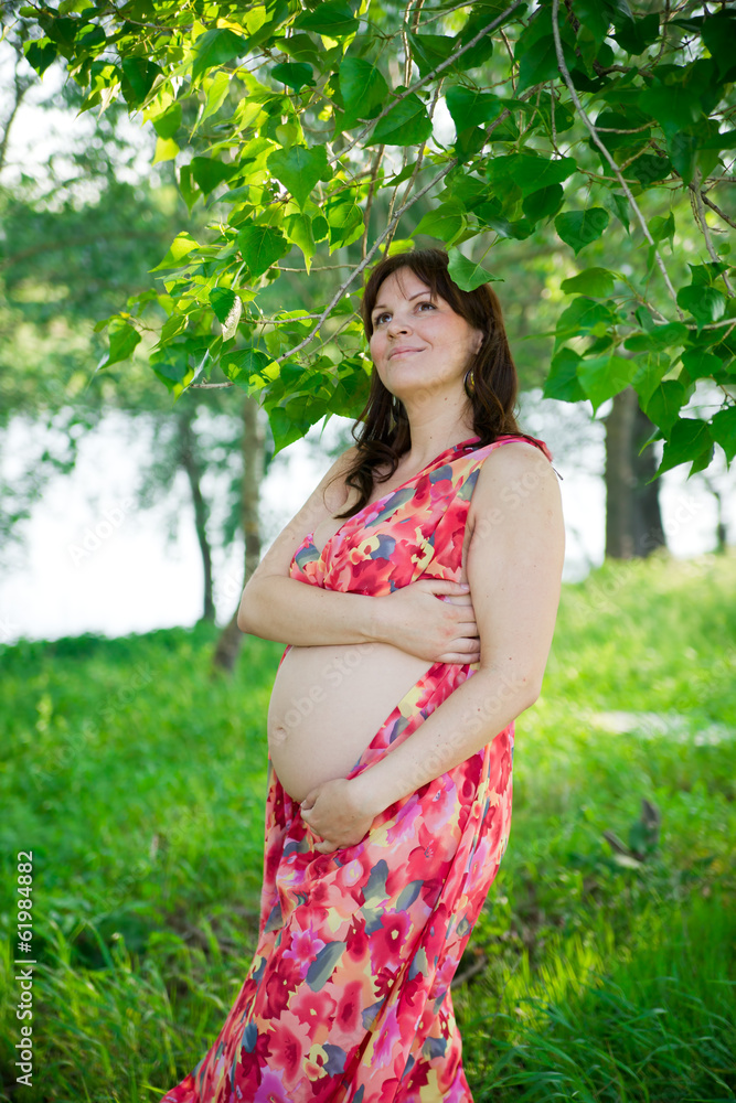 Pregnant woman in nature