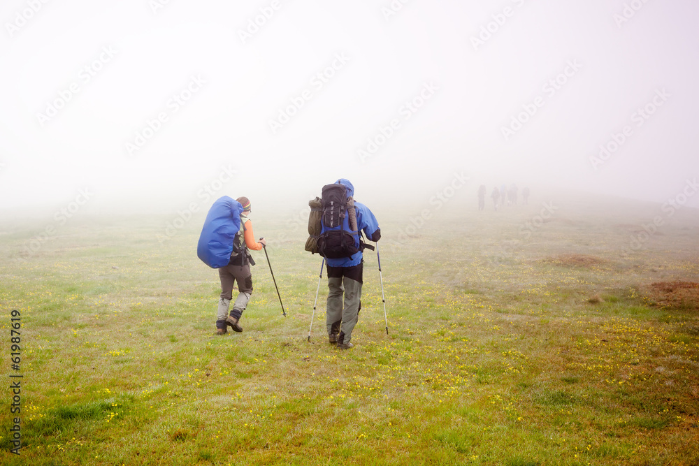 Hiking in Carpathian mountains in clouds