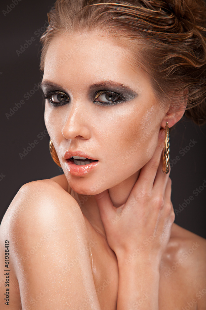 Fototapeta premium portrait of fresh young girl with shiny skin coated with oil