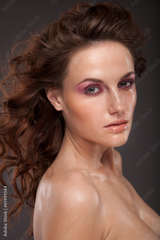 Sexy brunette woman with wet face. Beauty Fashion Girl Sexy brunette woman with wet face. Beauty Fashion Girl