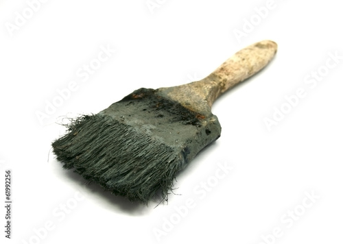 old dirty paint brush isolated on white background photo