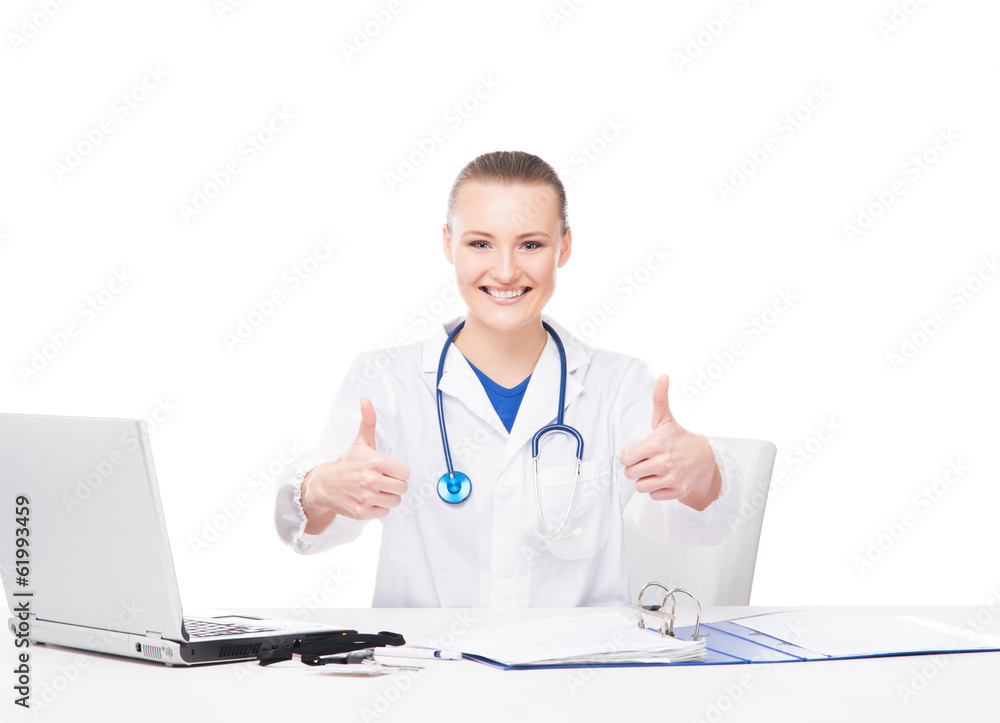 A cheerful female doctor working in an office isolated on white A cheerful female doctor working in an office isolated on white