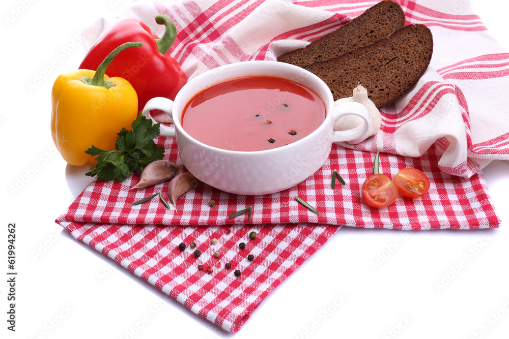 Tasty tomato soup and vegetables, isolated on white Tasty tomato soup and vegetables, isolated on white