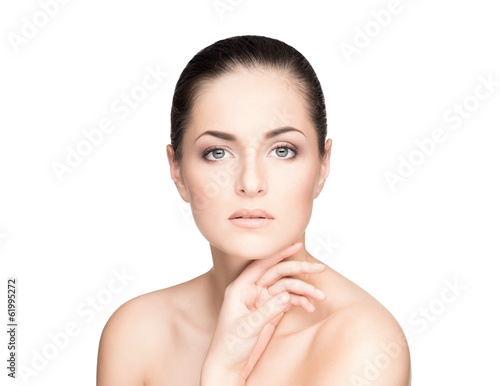 A healthy and sensual girl isolated on a white background