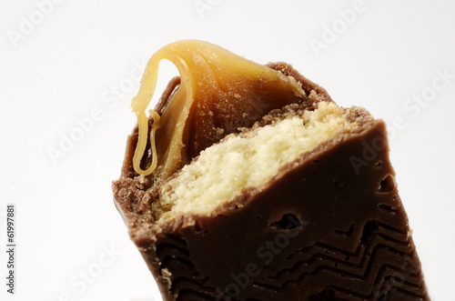 half a chocolate bar with caramel photo