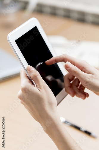 Woman working on a tablet