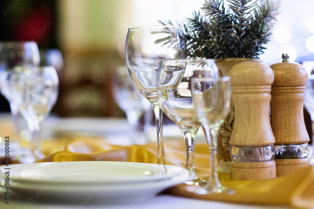 Fototapeta premium Served table in a restaurant at the holiday eve