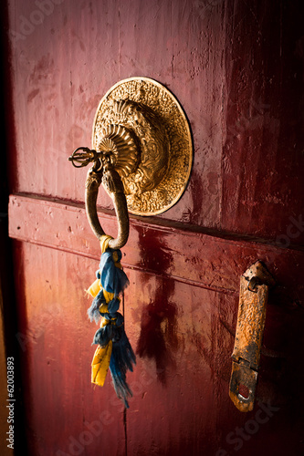 Old door at Buddhist monastery temple. India photo