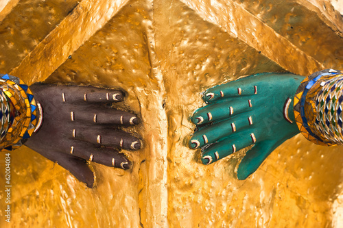 Canvas Print Architecture detail. Painted hand of  traditional Thai style sta