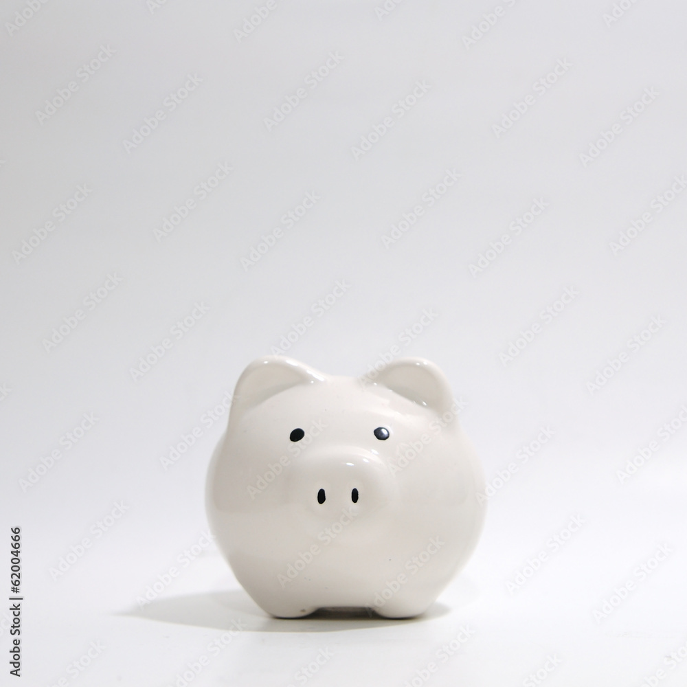Single white piggy bank, business concept Single white piggy bank, business concept