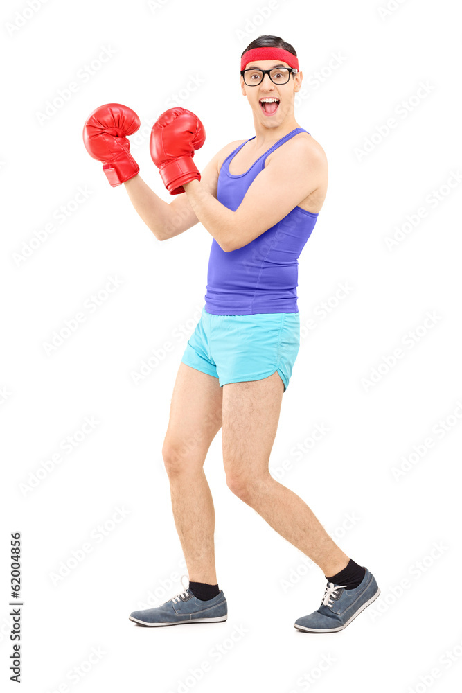 Young man with boxing gloves, posing