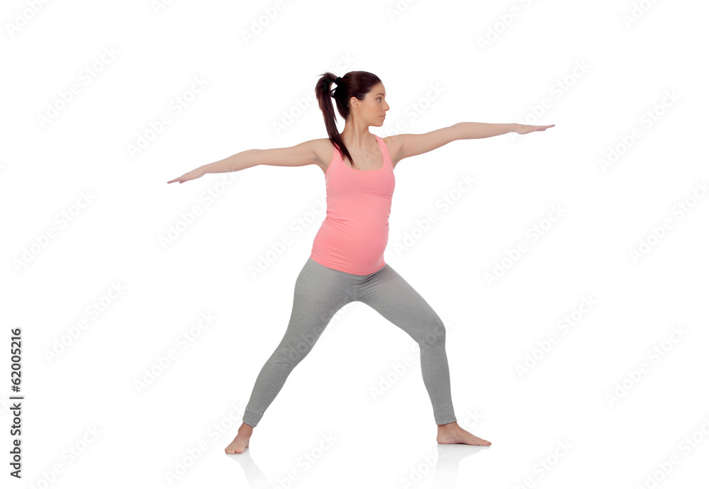 Beautiful pregnant woman doing yoga