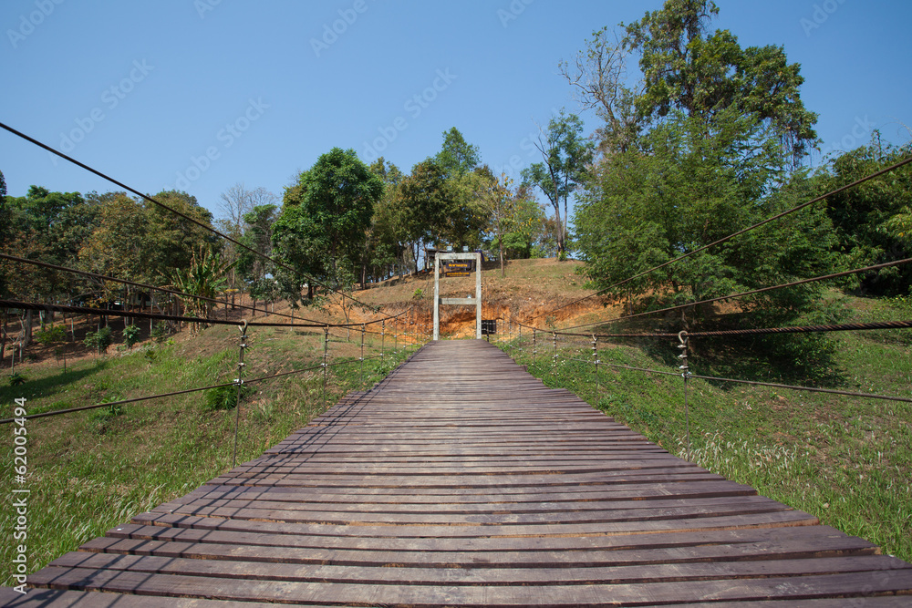 Adventure wooden rope suspension bridge at Kanchana Buri