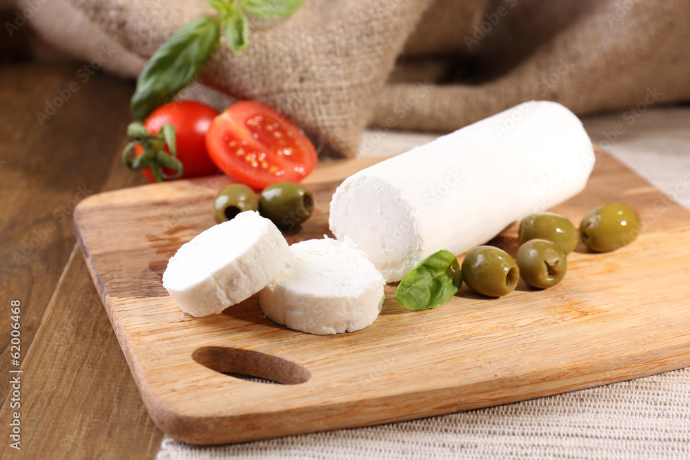 Tasty bushe cheese with tomatoes, olives and basil, Tasty bushe cheese with tomatoes, olives and basil,