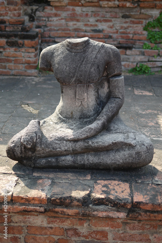 Headless damaged buddha in the ancient ayutthaya temple