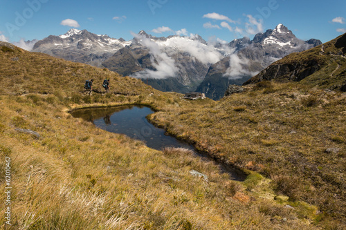 tourists hiking on Routeburn Track in Southern Alps