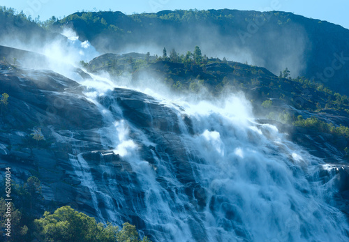 Summer Langfossen waterfall (Norway).