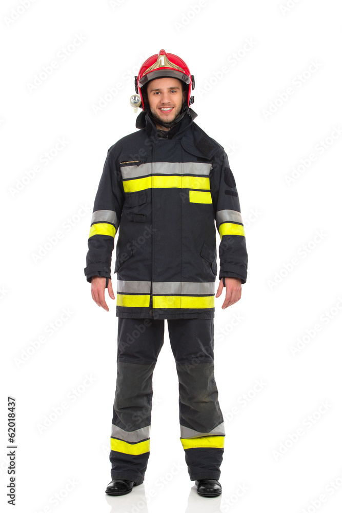 Fototapeta premium Firefighter posing, front view.