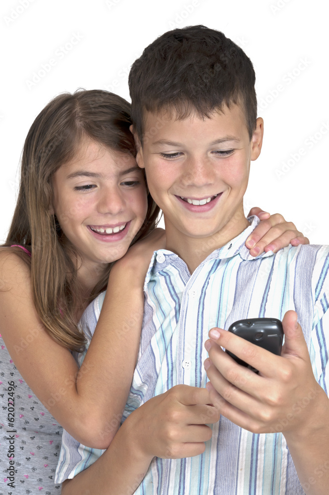 Girl & boy close looking mobile phone Girl & boy close looking mobile phone