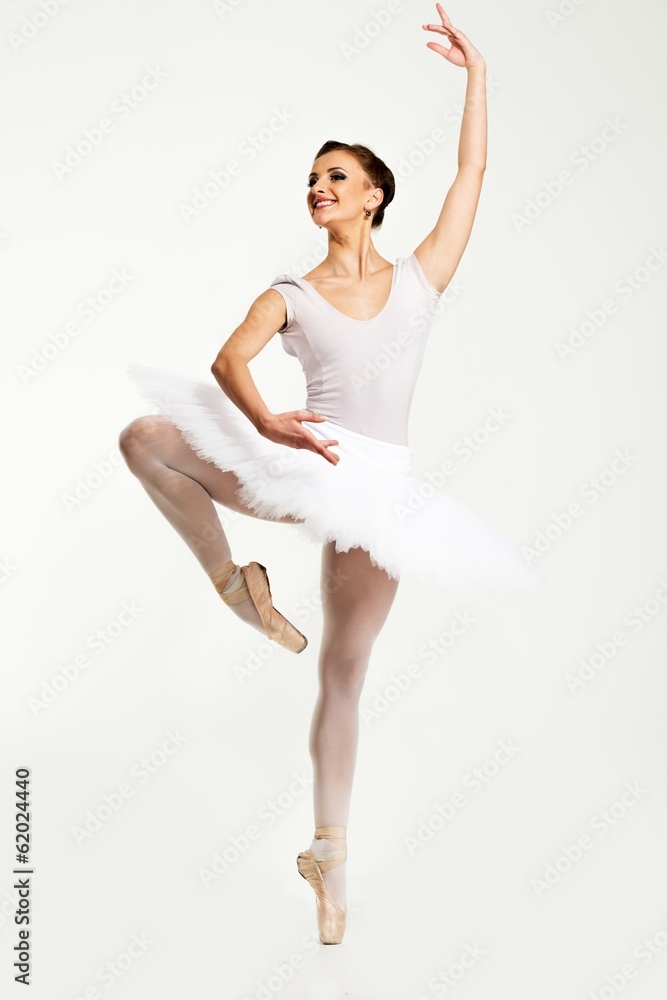 Young ballerina dancer in tutu showing her techniques Young ballerina dancer in tutu showing her techniques