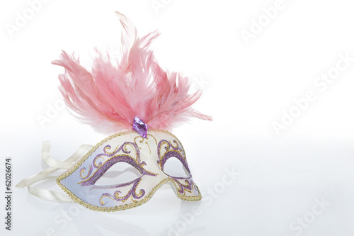Beautiful carnival mask with pink feathers