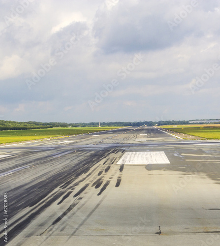 detail of runway with pattern of wheels