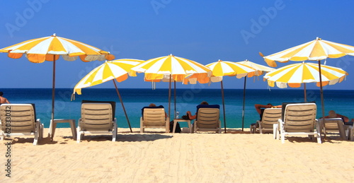 Fototapeta Naklejka Na Ścianę i Meble -  clear blue sky with beach umbrella