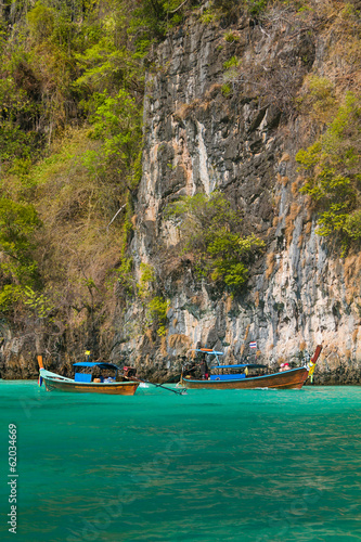 Longtail boats in the famous Maya bay of Phi-phi Leh island