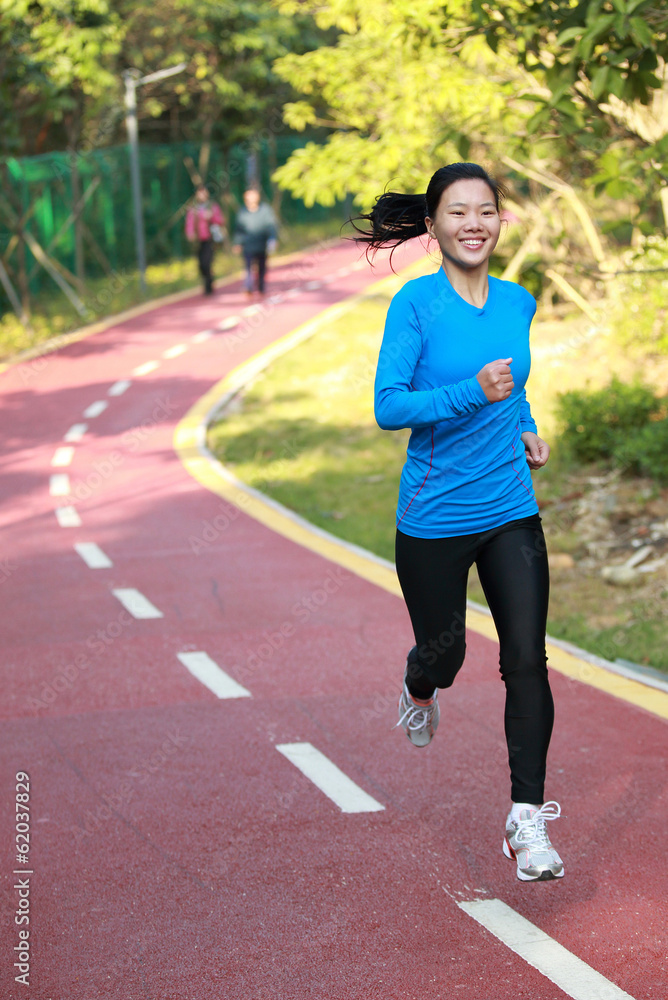 woman running at park woman running at park
