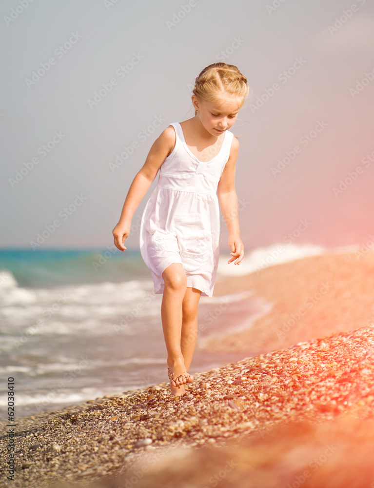 little girl on the beach Stock Photo | Adobe Stock