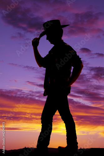 Silhouette man cowboy hat touch rim © Poulsons Photography