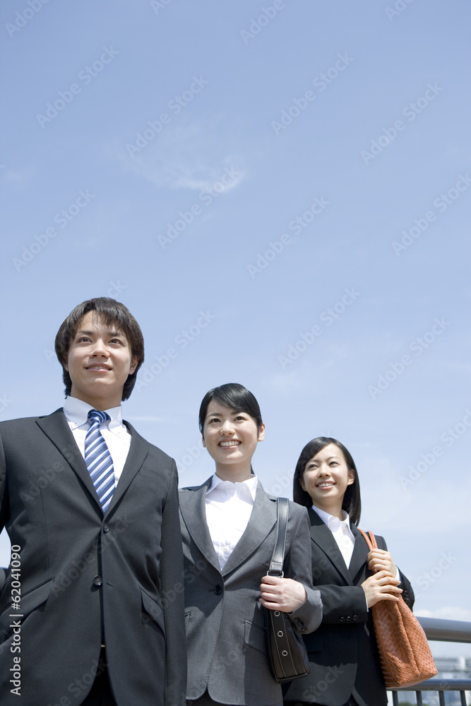 male and female new employee facing front male and female new employee facing front