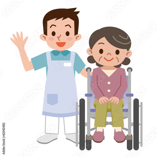 介護士と車椅子のシニア女性