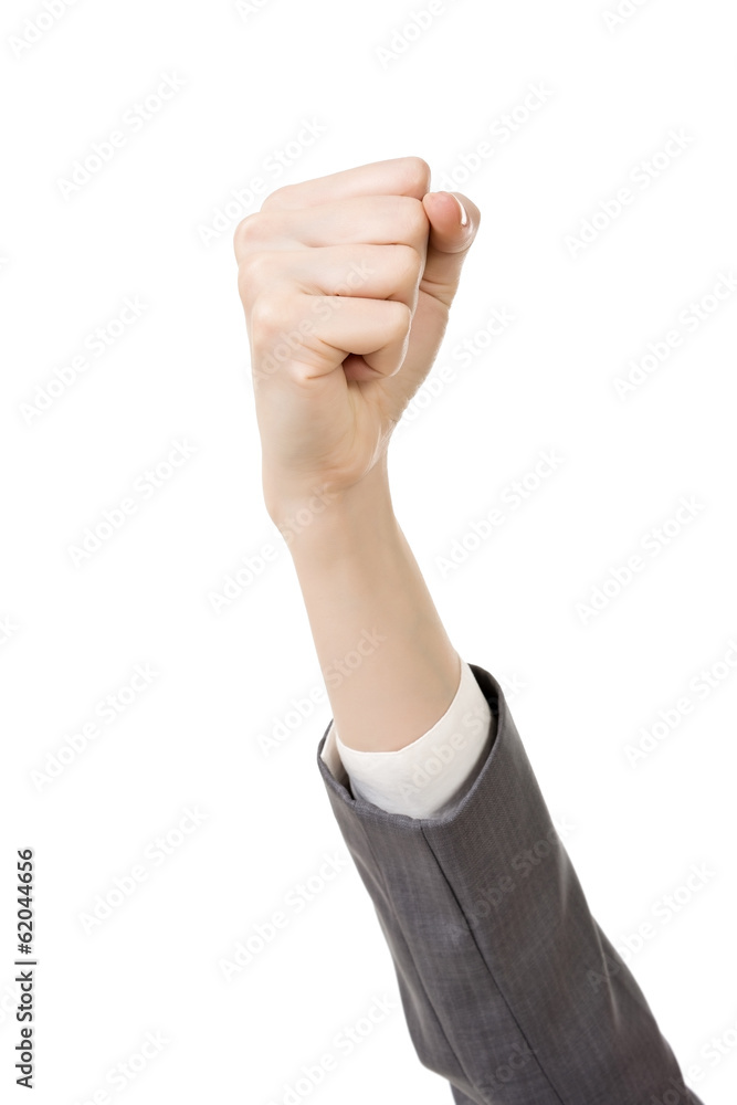 Business woman's hand with fist gesture Business woman's hand with fist gesture