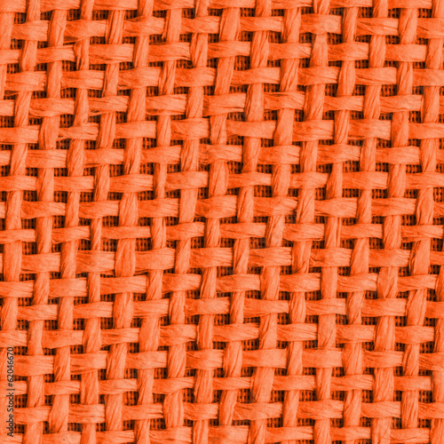 background of red interwoven plastic ribbons