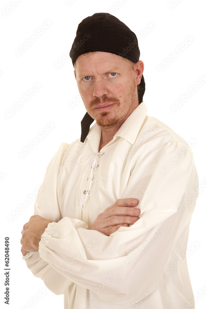 Man white shirt black bandana arms folded serious Man white shirt black bandana arms folded serious