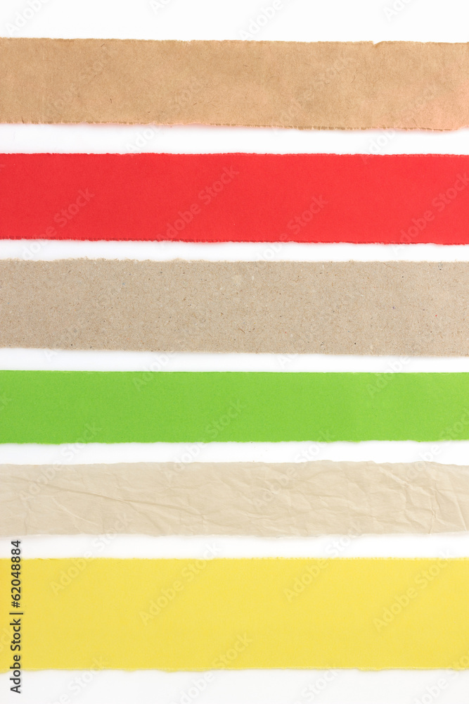 Fototapeta premium torn paper strip on white