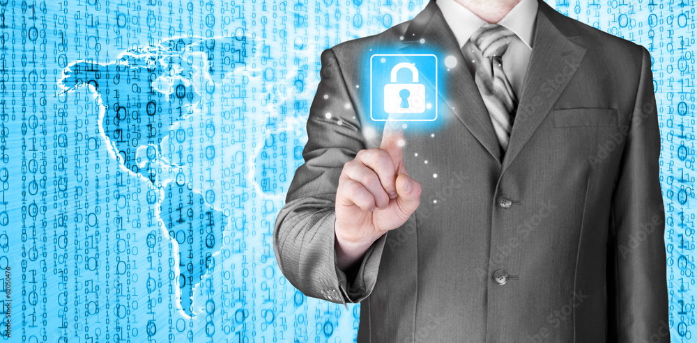 Businessman touch lock on world map background Businessman touch lock on world map background