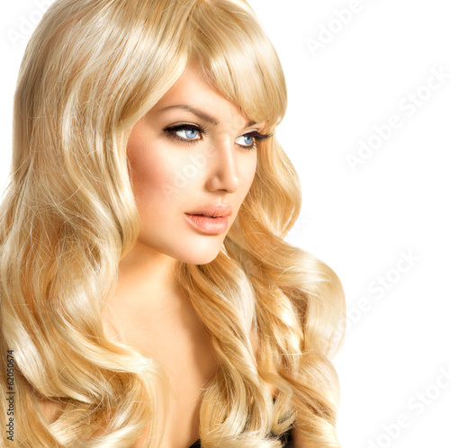 Beauty Blonde Woman. Beautiful girl with long curly blond hair #62050674