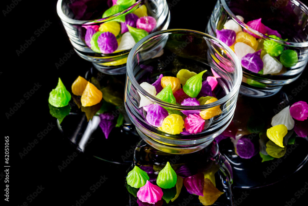Colorful sweetness Thai style dessert in glass on black backgrou Colorful sweetness Thai style dessert in glass on black backgrou