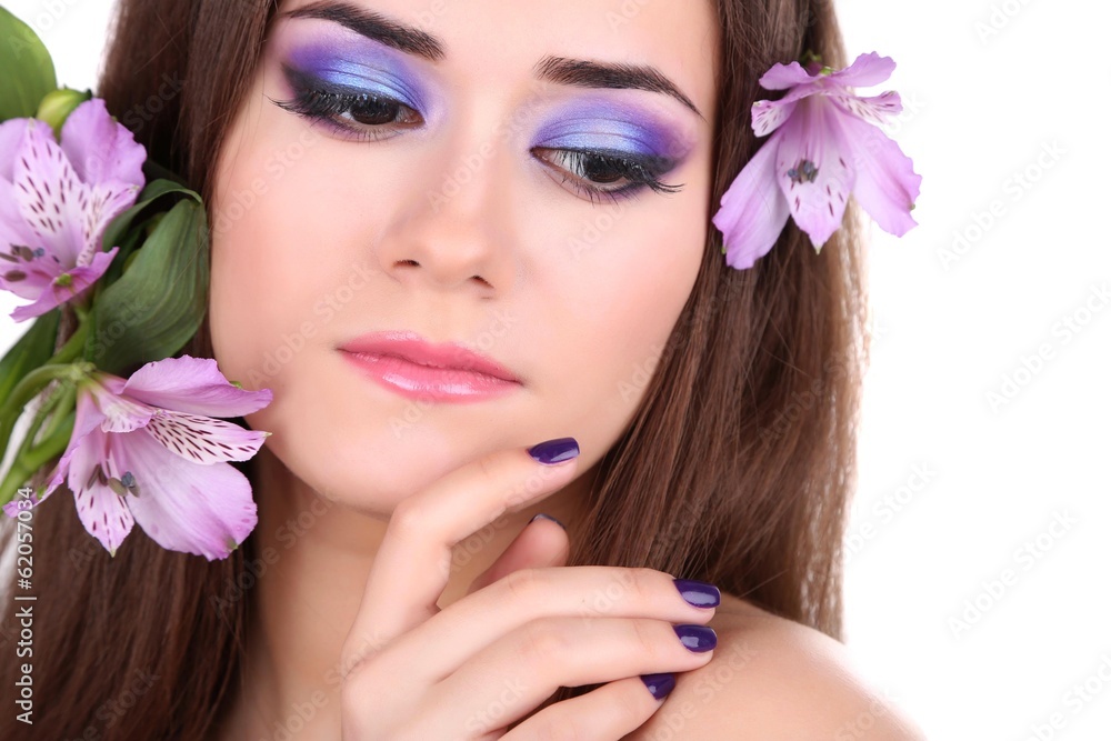 Beautiful young woman with flowers isolated on white Beautiful young woman with flowers isolated on white