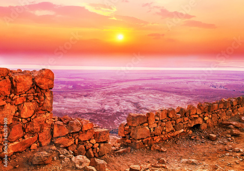 Beautiful sunrise over Masada fortress in Judaean Desert