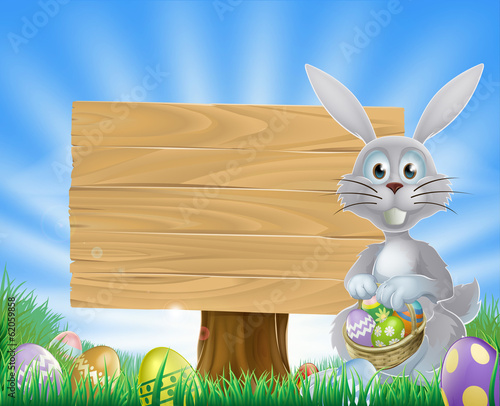 Easter bunny eggs and wooden sign