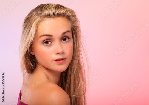 Beautiful teen blonde in studio