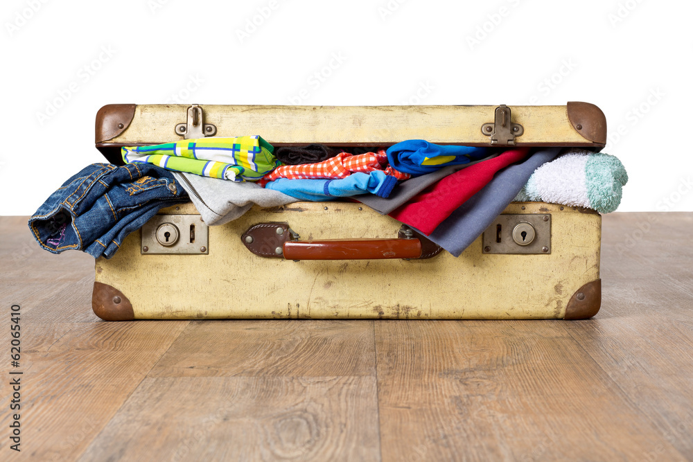 Übergepäck - Überfüllter Koffer Stock Photo | Adobe Stock