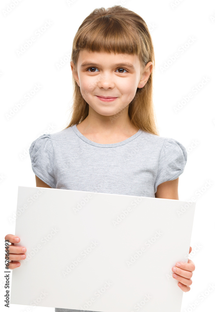 Little girl is holding blank banner Little girl is holding blank banner