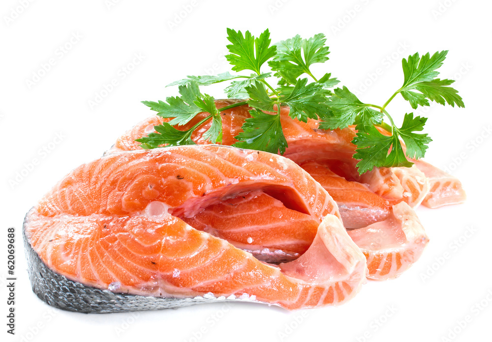 Slices of salmon, isolated on a white background. Slices of salmon, isolated on a white background.